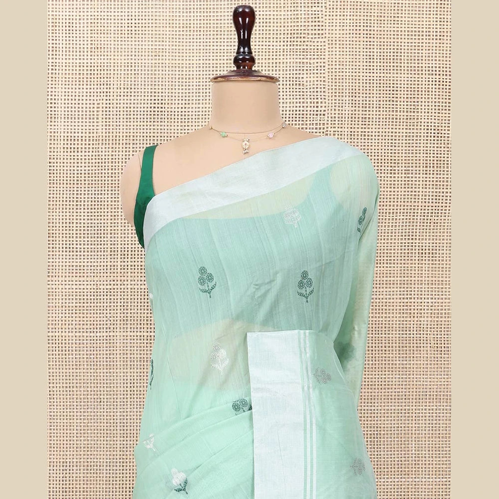 Pothys Green Chanderi Cotton Saree, Subtly Decked up with Floral Buttas All Over Its Body, Highlighted by a Bavanji Border, Pallu Steeped with Zari Stripes, and Paired with a Matching Blouse