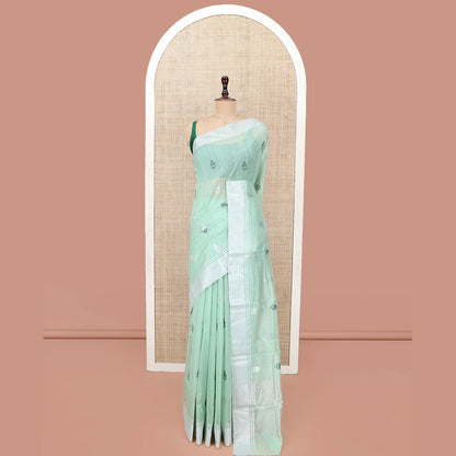 Pothys Green Chanderi Cotton Saree, Subtly Decked up with Floral Buttas All Over Its Body, Highlighted by a Bavanji Border, Pallu Steeped with Zari Stripes, and Paired with a Matching Blouse