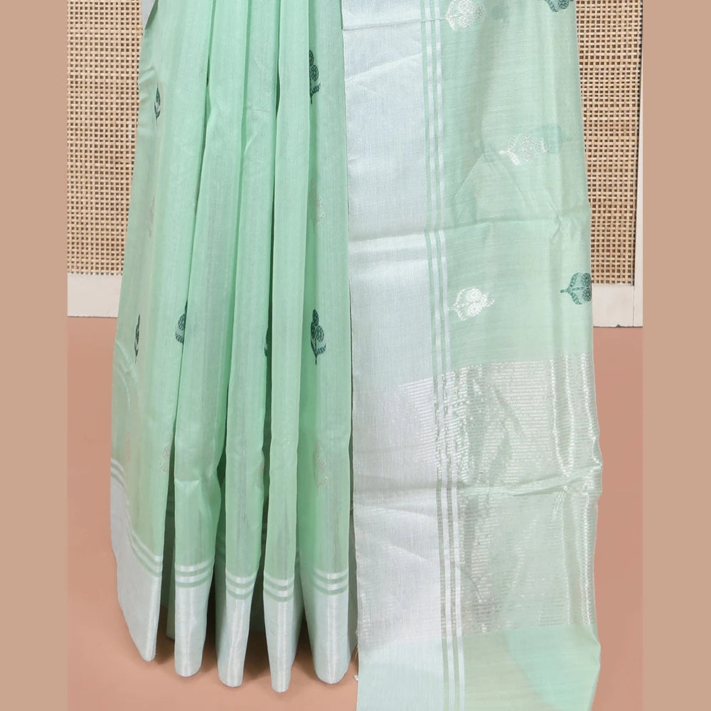 Pothys Green Chanderi Cotton Saree, Subtly Decked up with Floral Buttas All Over Its Body, Highlighted by a Bavanji Border, Pallu Steeped with Zari Stripes, and Paired with a Matching Blouse