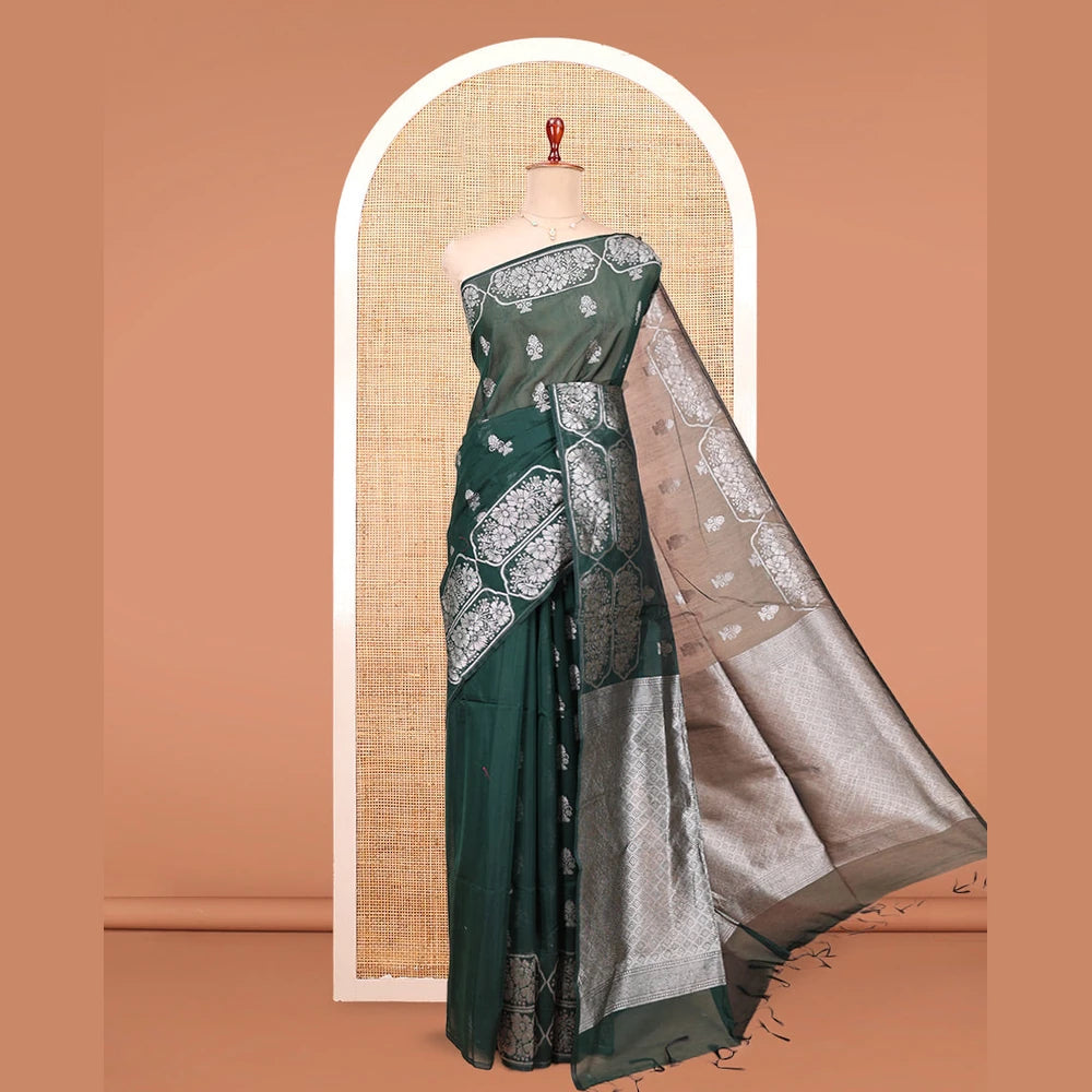 Pothys Green Semi-Silk Cotton Saree, Decked Up with Zari Buttas All Over Its Body, Highlighted by a Zari Border of Floral Designs, Gleaming Jaal Pallu, and Paired with a Matching Blouse