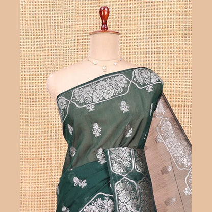 Pothys Green Semi-Silk Cotton Saree, Decked Up with Zari Buttas All Over Its Body, Highlighted by a Zari Border of Floral Designs, Gleaming Jaal Pallu, and Paired with a Matching Blouse