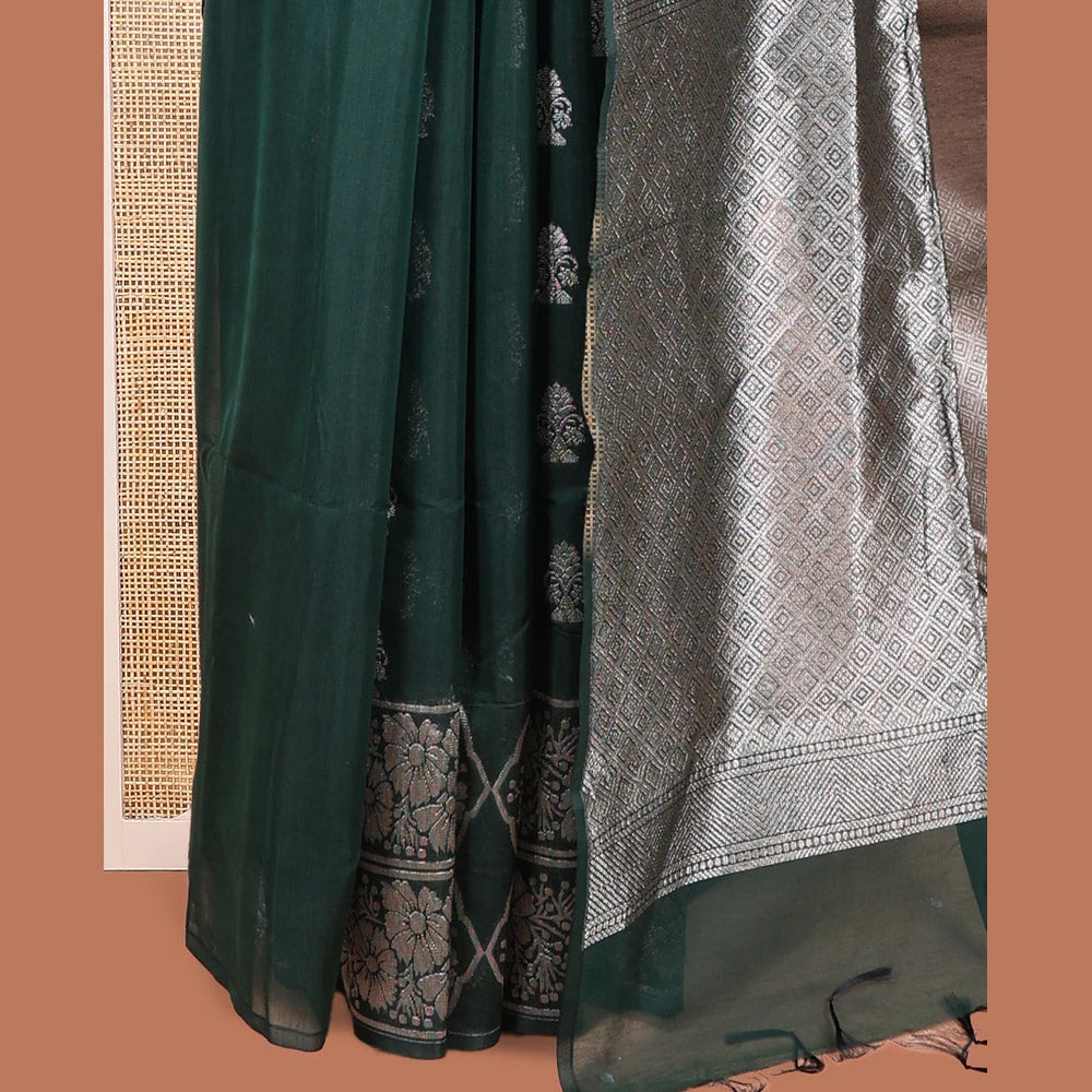 Pothys Green Semi-Silk Cotton Saree, Decked Up with Zari Buttas All Over Its Body, Highlighted by a Zari Border of Floral Designs, Gleaming Jaal Pallu, and Paired with a Matching Blouse