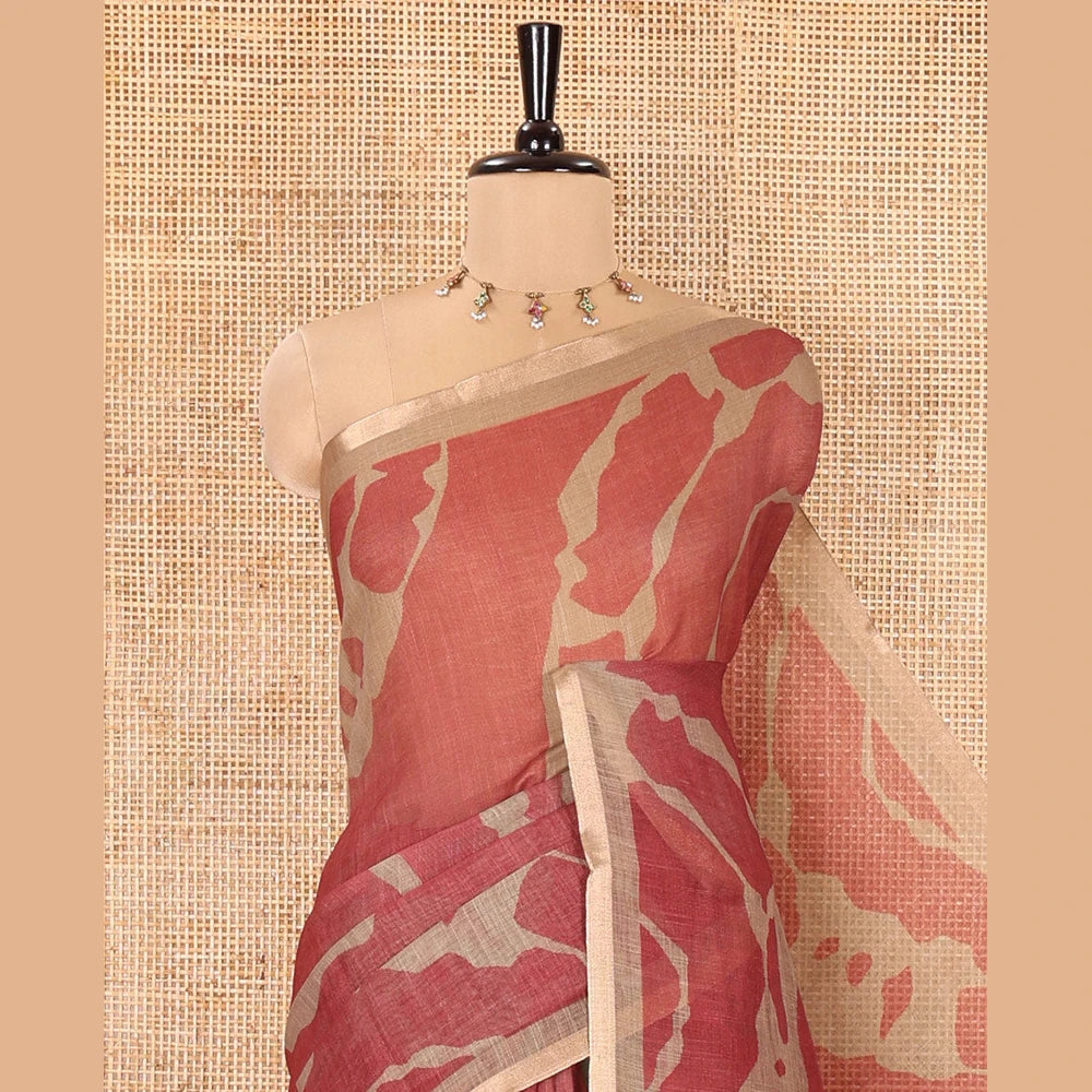 Pothys Chikoo Linen Cotton Saree, Adorned with Shibori Prints on Its Body, Subtle Contrast Piping Border, Pallu of Floral Print, and Paired with a Matching Blouse