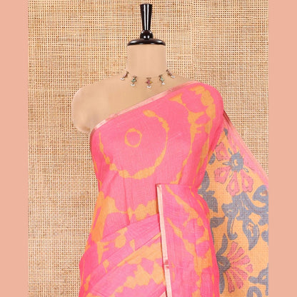 Pothys Pink Linen Cotton Saree, Ornamented with Shibori Printed on Its Body, Subtle Piping Border, Pallu Features Floral Print, and Paired with a Contrast Floral Printed Blouse