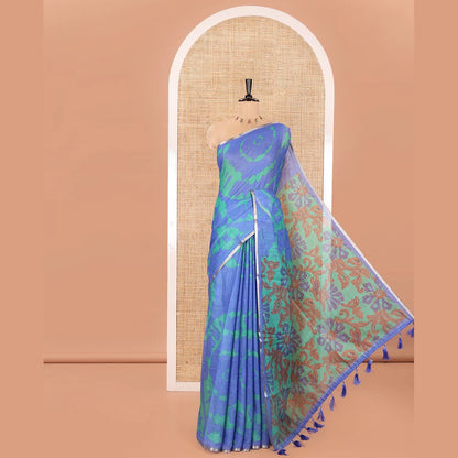 Pothys Royal Blue Linen Cotton Saree, Embellished with Shibori Printed on Its Body, Subtle Piping Border, Pallu Features Floral Print, and Paired with a Contrast Floral Printed Blouse