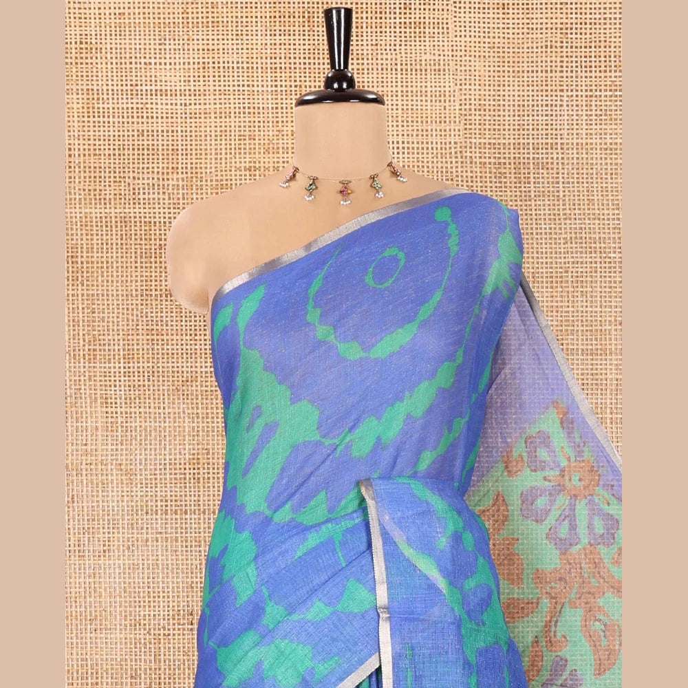 Pothys Royal Blue Linen Cotton Saree, Embellished with Shibori Printed on Its Body, Subtle Piping Border, Pallu Features Floral Print, and Paired with a Contrast Floral Printed Blouse