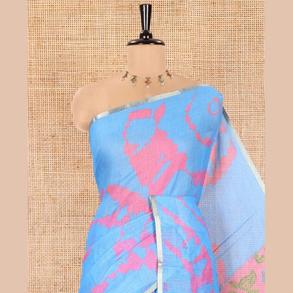 Pothys Light Blue Linen Cotton Saree, Graced with Shibori Printed on Its Body, Subtle Piping Border, Pallu Features Floral Print, and Paired with a Contrast Floral Printed Blouse