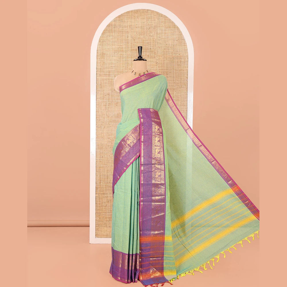 Pothys Sea Green Chettinad Cotton Saree, Subtly Sparkled with Stripes on Its Body, Complemented by a Contrast Traditional Design Zari Border, Subtly Striped Pallu, and Paired with a Matching Blouse
