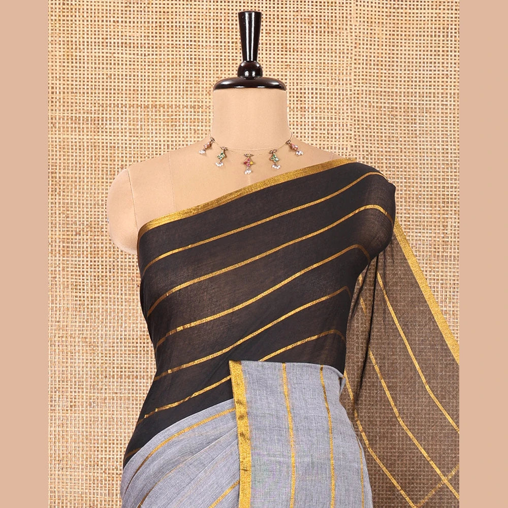 Pothys Grey and Black Khadi Mul Cotton Saree, Elevated with Horizontal Zari Stripes on Its Body, Zari Piping Border, Subtly Striped Pallu, and Paired with a Contrast Blouse