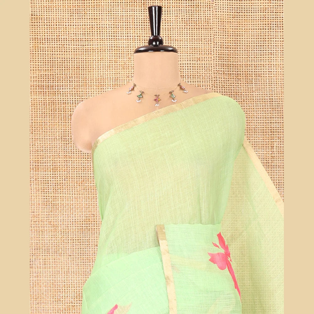 Pothys Green Linen Cotton Saree, Adorned with Butterfly Buttas All Over Its Body, Subtle Piping Border, Pallu of Butterfly Print, and Paired with a Contrast Fairy Motifs Printed Blouse