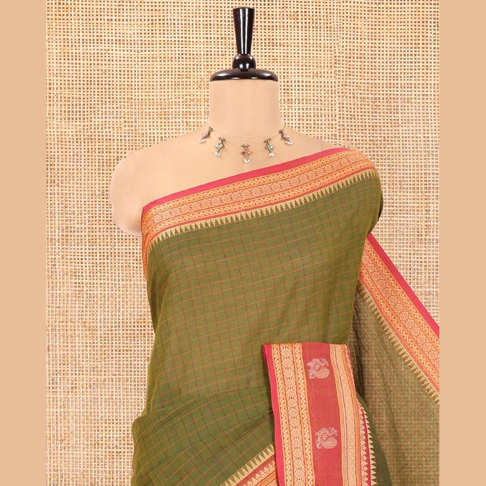 Pothys Green Chettinad Cotton Saree, Subtly Sparkled with Checks on Its Body, Complemented by a Contrast Traditional Border of Peacock Designs, Subtly Striped Pallu, and Paired with a Matching Blouse