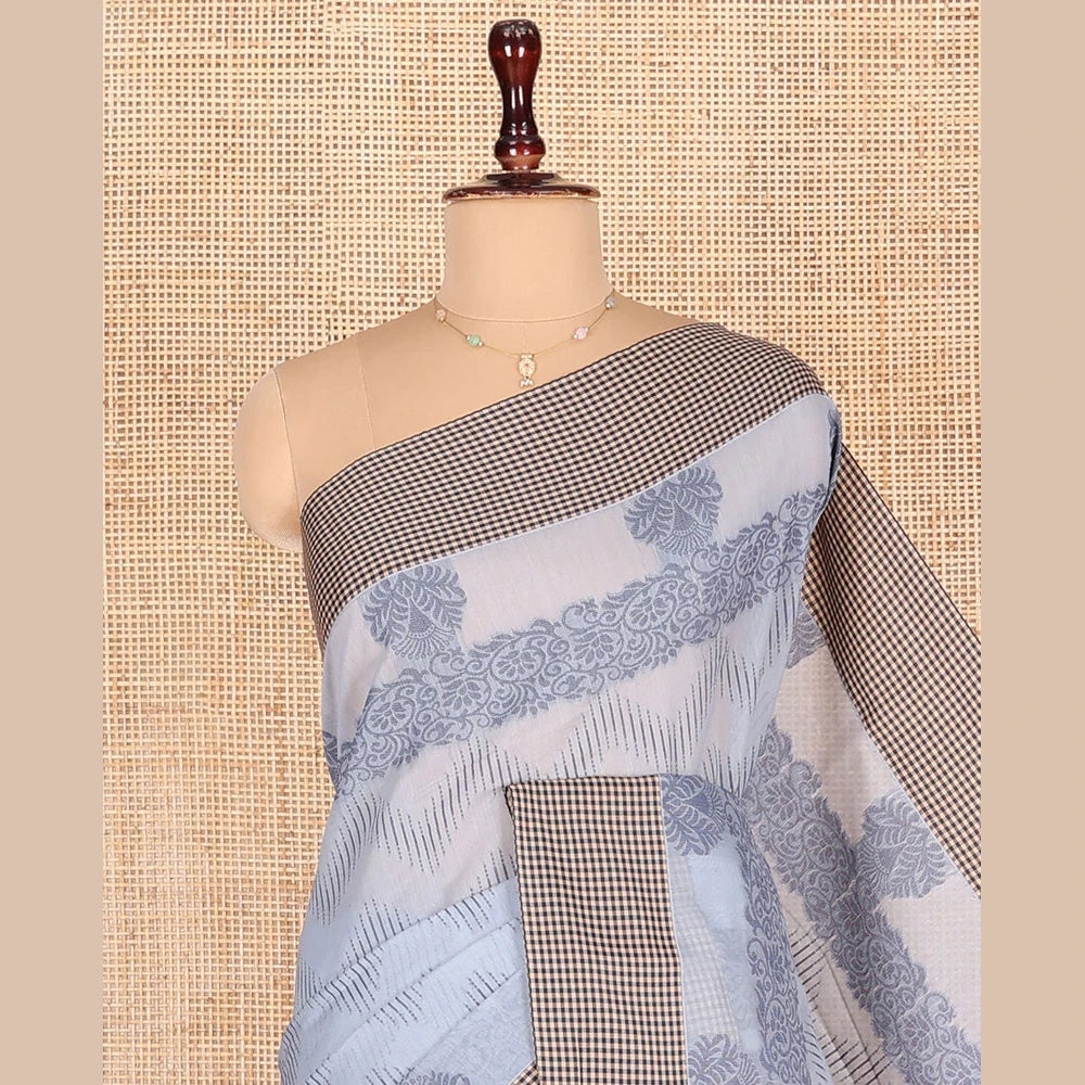 Pothys Grey Semi-Silk Cotton Saree, Ornamented with Chevron Stripes All Over Its Body, Complemented by Contrast Micro-Checked Border, Pallu of Jaal Designs, and paired with a Matching Blouse