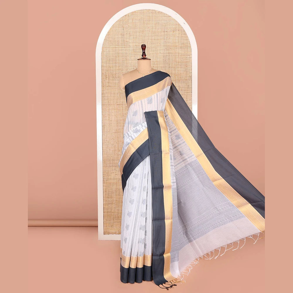 Pothys Grey Semi-Silk Cotton Saree, Embellished with Buttas and Stripes All Over Its Body, Complemented by a Contrast Traditional Zari Design Border, Pallu of Jaal Designs, and Paired with a Matching Blouse