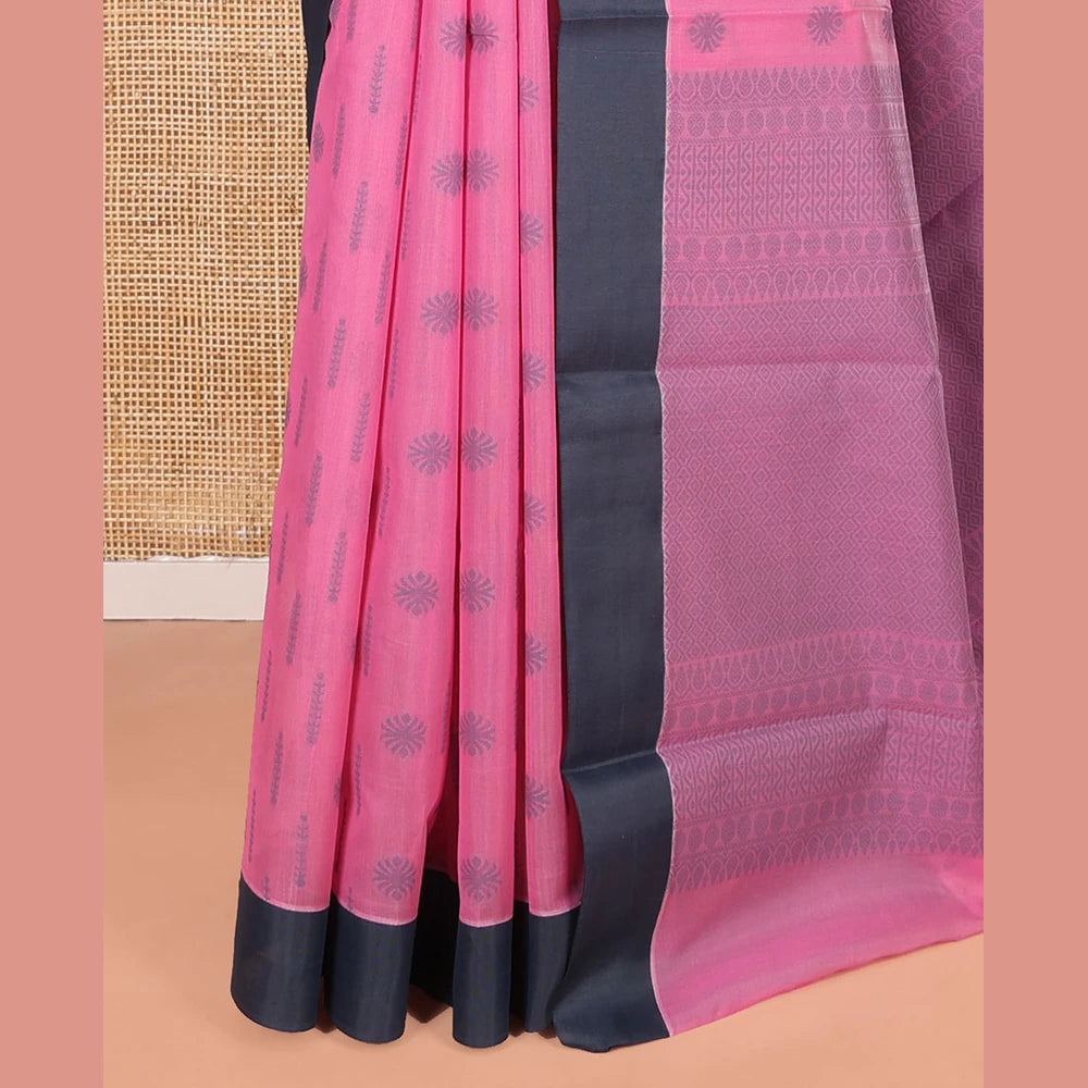 Pothys Pink Semi-Silk Cotton Saree, Subtly Sparkled with Buttas All Over Its Body, Complemented by Contrast Border, Geometric Patterned Pallu, and Paired with a Matching Blouse