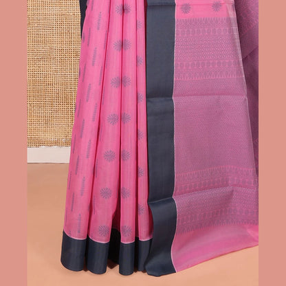Pothys Pink Semi-Silk Cotton Saree, Subtly Sparkled with Buttas All Over Its Body, Complemented by Contrast Border, Geometric Patterned Pallu, and Paired with a Matching Blouse
