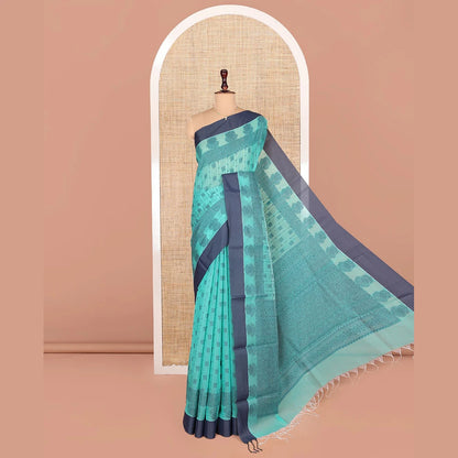 Pothys Green Semi-Silk Cotton Saree, Subtly Sparkled with Stripes and Buttas All Over Its Body, Complemented by Contrast Border, Intricately Designed Pallu, and Paired with a Matching Blouse