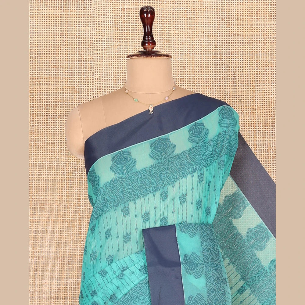 Pothys Green Semi-Silk Cotton Saree, Subtly Sparkled with Stripes and Buttas All Over Its Body, Complemented by Contrast Border, Intricately Designed Pallu, and Paired with a Matching Blouse