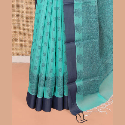 Pothys Green Semi-Silk Cotton Saree, Subtly Sparkled with Stripes and Buttas All Over Its Body, Complemented by Contrast Border, Intricately Designed Pallu, and Paired with a Matching Blouse