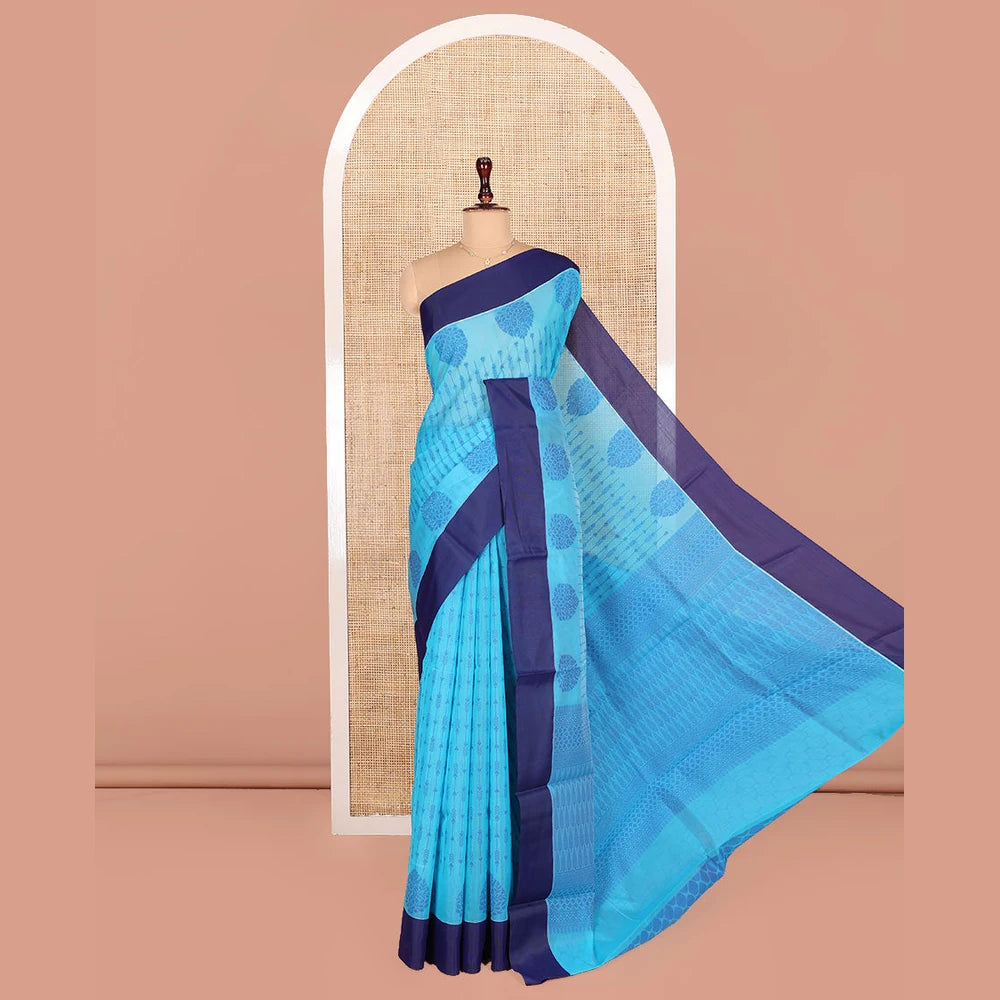 Pothys Blue Semi-Silk Cotton Saree, Subtly Sparkled with Stripes All Over Its Body, Complemented by Contrast Border, Pallu Steeped with Pine Tree Motifs, and Paired with a Matching Blouse