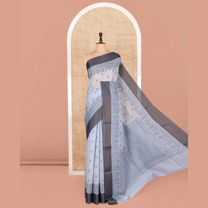 Pothys Grey Semi-Silk Cotton Saree, Detailed with Buttas All Over Its Body, Complemented by a Contrast Border, Pallu Steeped with Floral Designs, and Paired with a Matching Blouse