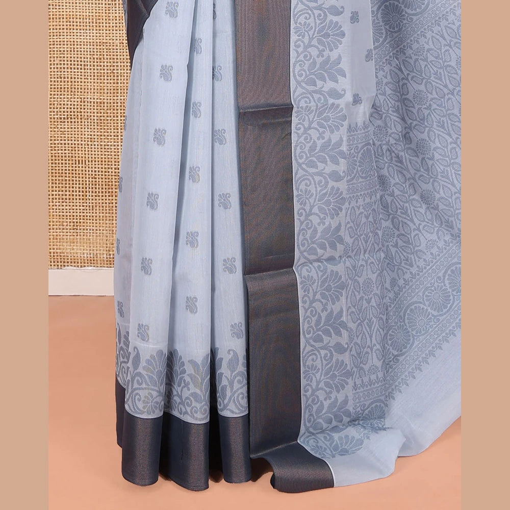 Pothys Grey Semi-Silk Cotton Saree, Detailed with Buttas All Over Its Body, Complemented by a Contrast Border, Pallu Steeped with Floral Designs, and Paired with a Matching Blouse