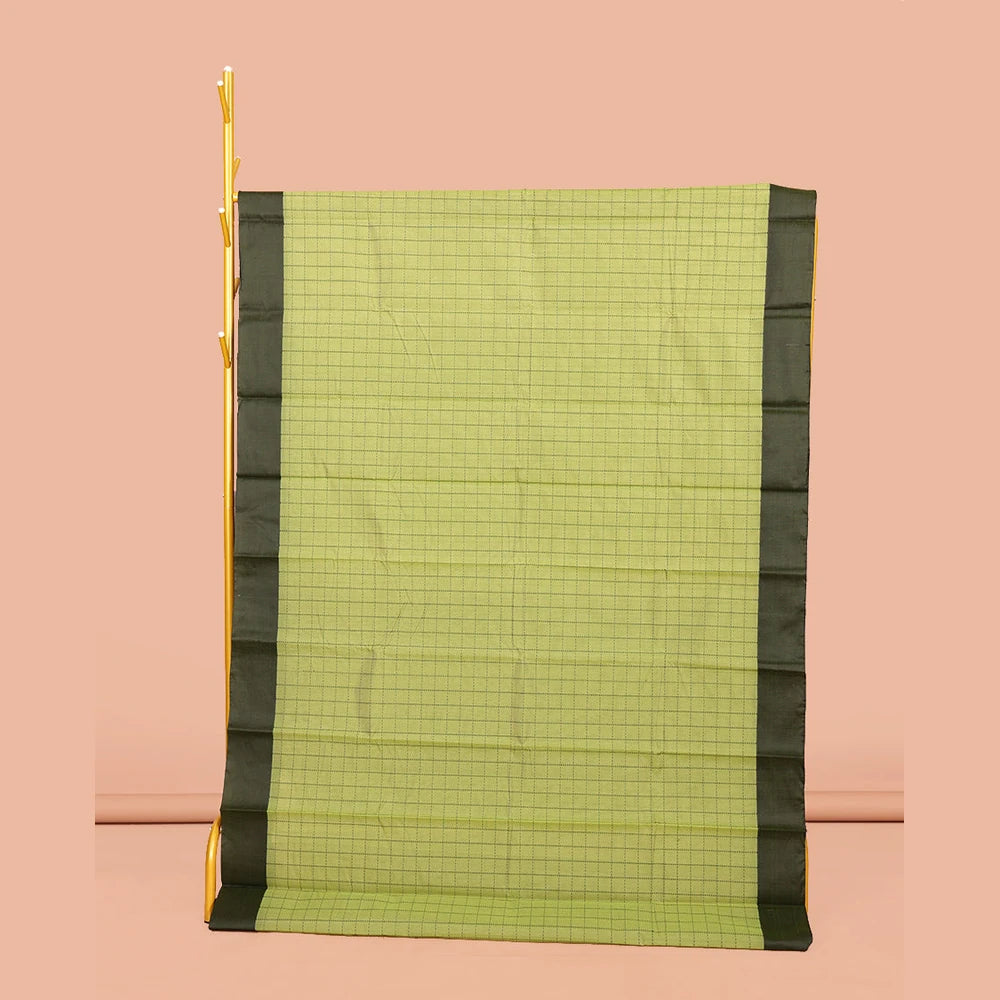 Pothys Green Semi-Silk Cotton Saree, Subtly Sparkled with Checks All Over Its Body, Complemented by a Contrast Border, Striped Pallu, and Paired with a Matching Blouse