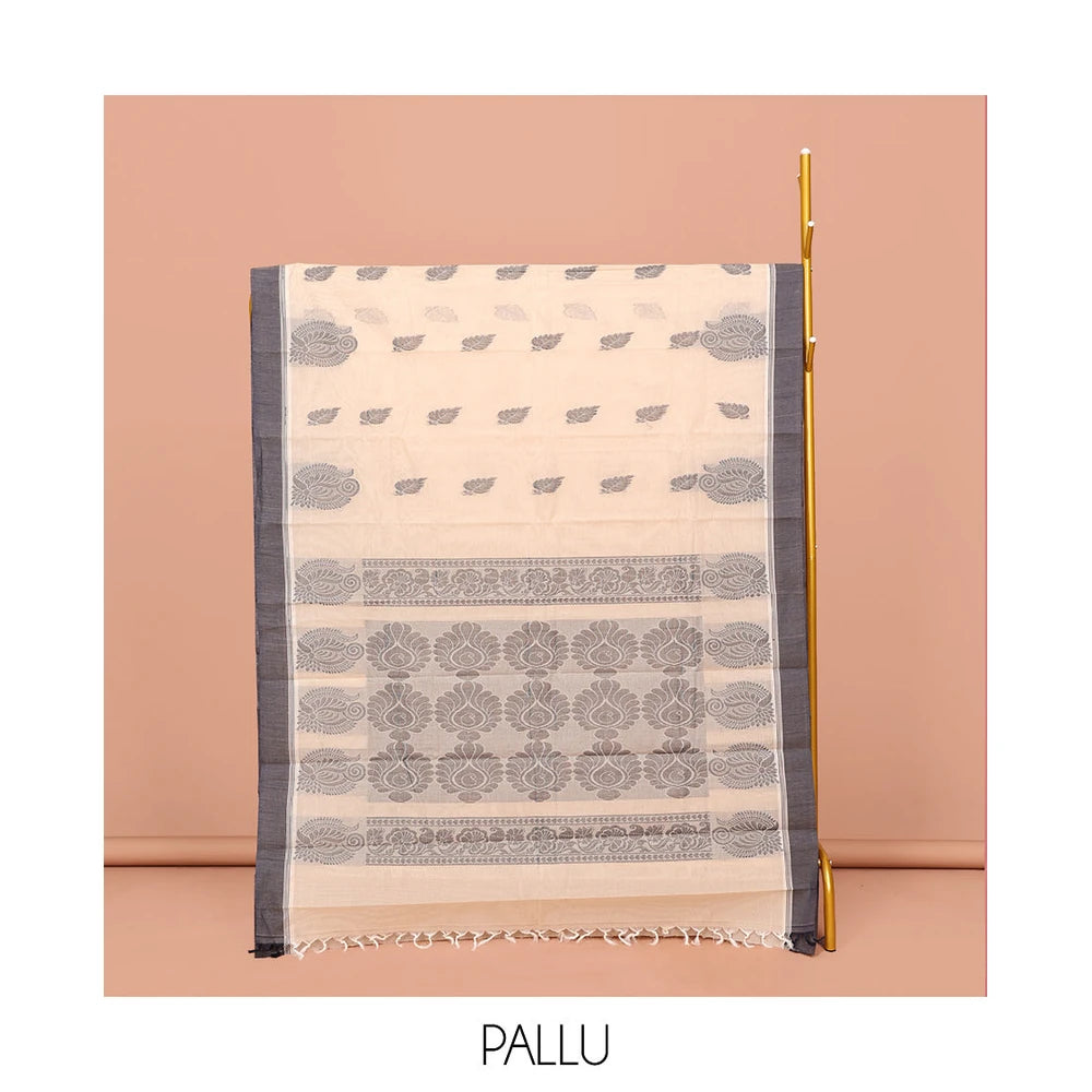 Pothys Cream Kanchi Cotton Saree, Embellished with Leaf Buttas All Over Its Body, Complemented by Contrast Border, Pallu of Intricate Designs, and Paired with a Matching Blouse