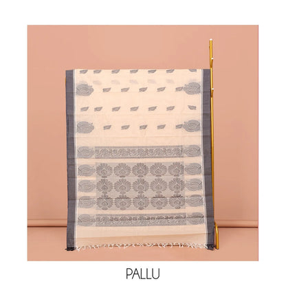 Pothys Cream Kanchi Cotton Saree, Embellished with Leaf Buttas All Over Its Body, Complemented by Contrast Border, Pallu of Intricate Designs, and Paired with a Matching Blouse