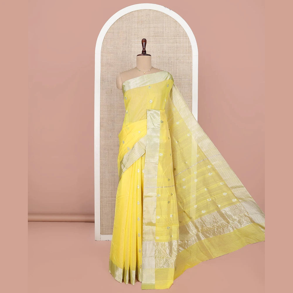 Pothys Yellow Chanderi Cotton Saree, Sparkled with Buttas All Over Its Body, Highlighted by a Zari Border, Pallu Steeped with Zari Designs, and Paired with a Matching Blouse