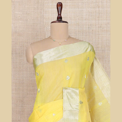 Pothys Yellow Chanderi Cotton Saree, Sparkled with Buttas All Over Its Body, Highlighted by a Zari Border, Pallu Steeped with Zari Designs, and Paired with a Matching Blouse