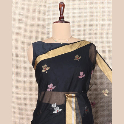 Pothys Black Chanderi Cotton Saree, Embellished with Floral Buttas All Over Its Body, Highlighted by Zari Border, Pallu Steeped with Zari Stripes, and Paired with a Matching Blouse