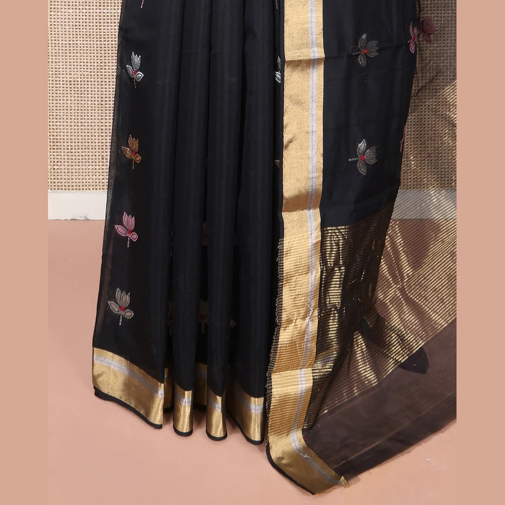 Pothys Black Chanderi Cotton Saree, Embellished with Floral Buttas All Over Its Body, Highlighted by Zari Border, Pallu Steeped with Zari Stripes, and Paired with a Matching Blouse