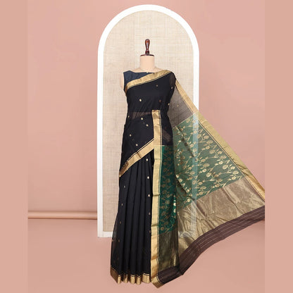 Pothys Black Chanderi Cotton Saree, Ornamented with Floral Buttas All Over Its Body, Highlighted by Zari Border, Complemented by Contrast Pallu of Floral Jaal Designs, and Paired with a Contrast Blouse