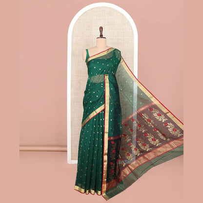 Pothys Green Chanderi Cotton Saree, Spotlighted with Zari Buttas All Over Its Body, Highlighted by Zari Border, Pallu of Floral Buttas, and Paired with a Contrast Blouse
