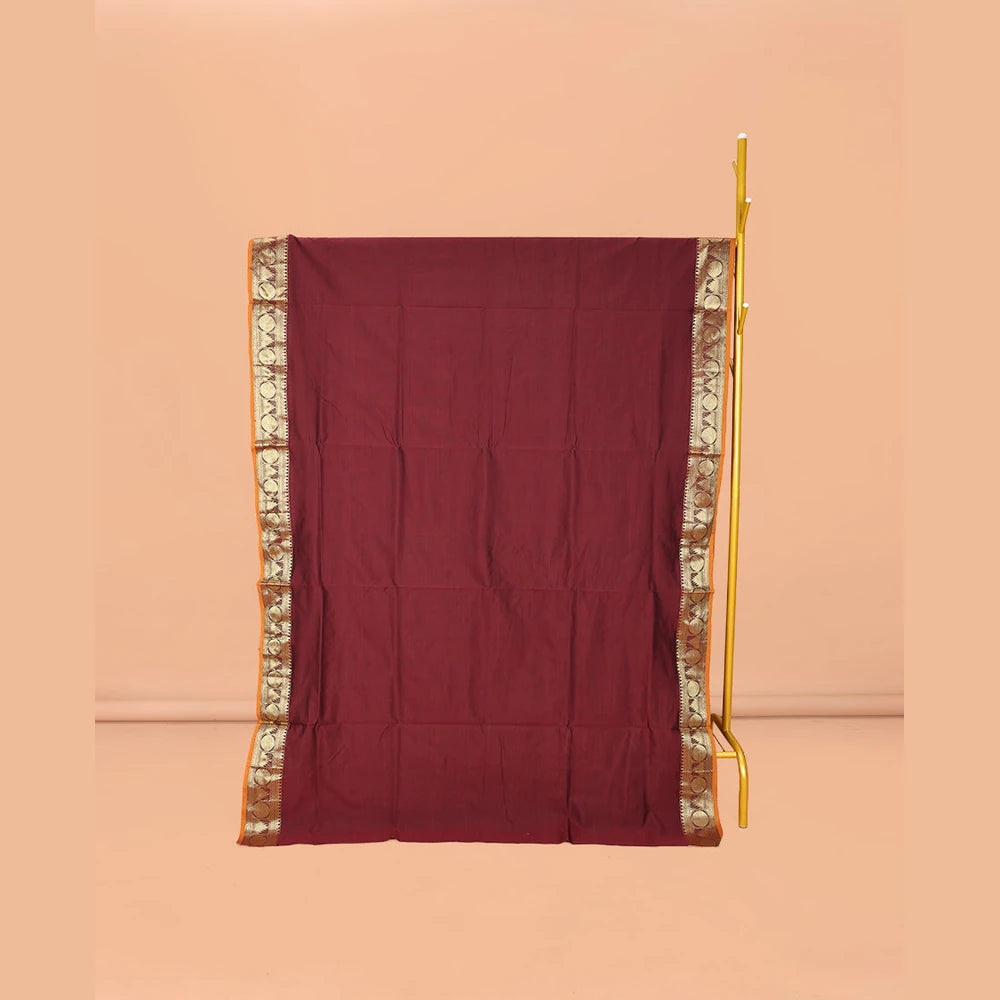 Pothys Maroon Plain Poly Cotton Saree, Complemented by a Contrast Traditional Zari Border of Temple and Rudraksham Designs, Contrast Striped Pallu, and Paired with a Contrast Blouse