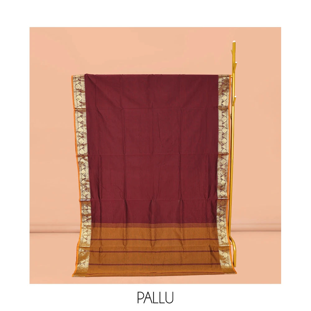 Pothys Maroon Plain Poly Cotton Saree, Complemented by a Contrast Traditional Zari Border of Temple and Rudraksham Designs, Contrast Striped Pallu, and Paired with a Contrast Blouse