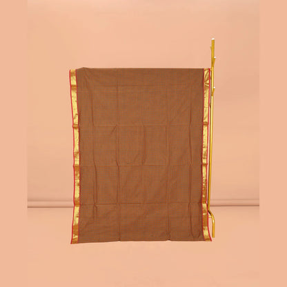 Pothys Orange Micro-Checked Poly Cotton Saree, Complemented by a Contrast Zari Border, Contrast Striped Pallu, and Paired with a Contrast Blouse