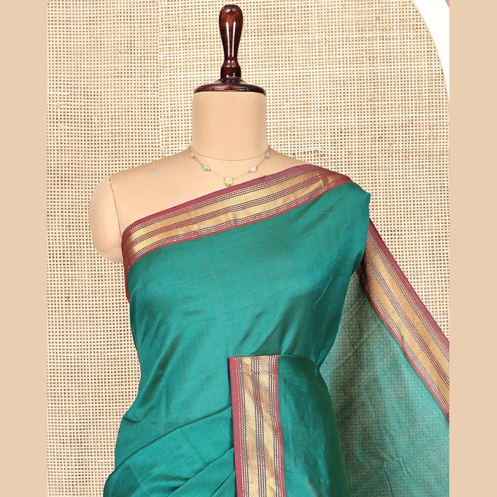 Pothys Green Plain Poly Cotton Saree, Complemented by Contrast Traditional Zari Border, Vibrant Striped Pallu, and Paired with a Contrast Blouse