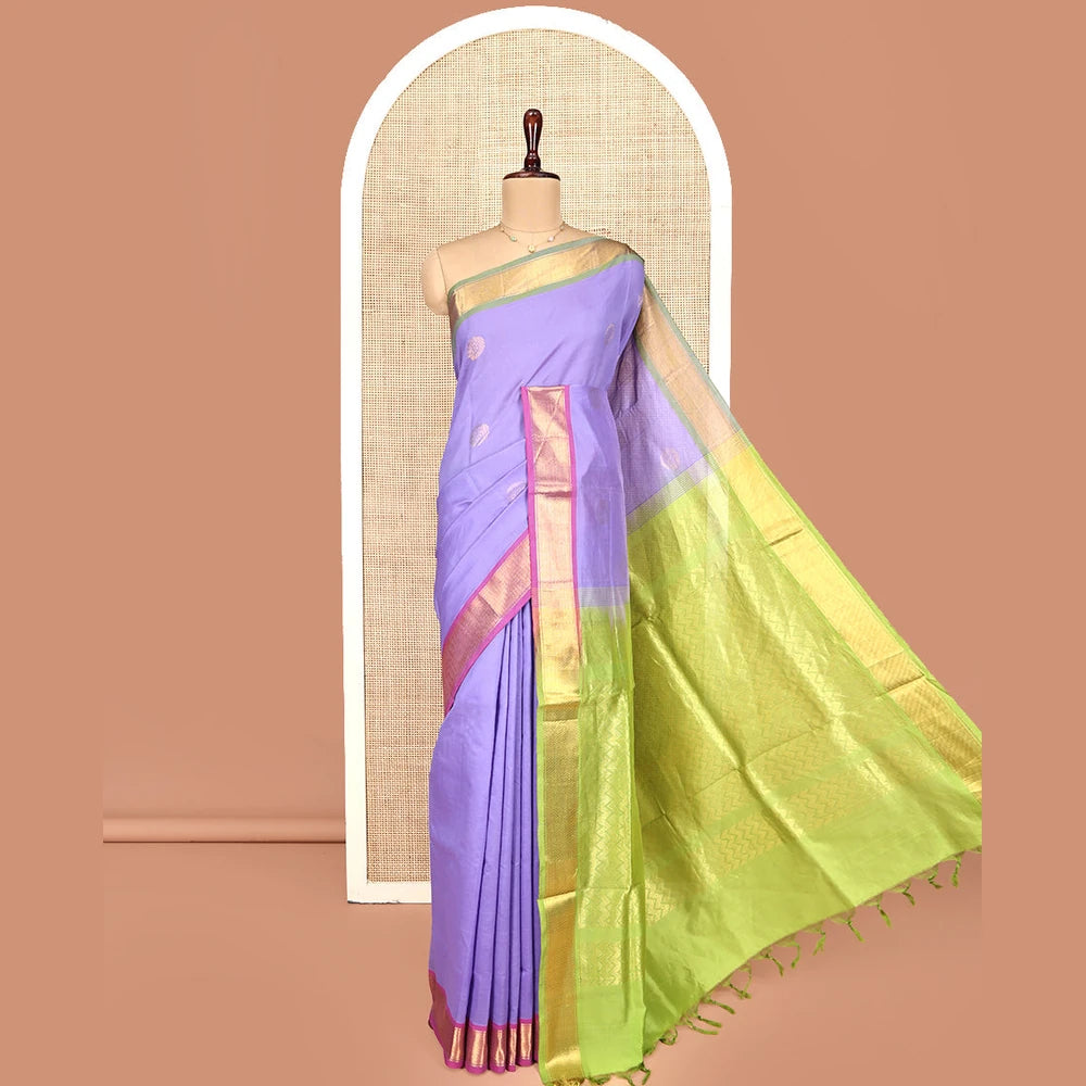 Pothys Lavender Poly Cotton Saree, Enthralled with Zari Buttas on Its Body, Complemented by Contrast Ganga-Jamuna Border, Chevron Striped Pallu, and Paired with a Contrast Blouse