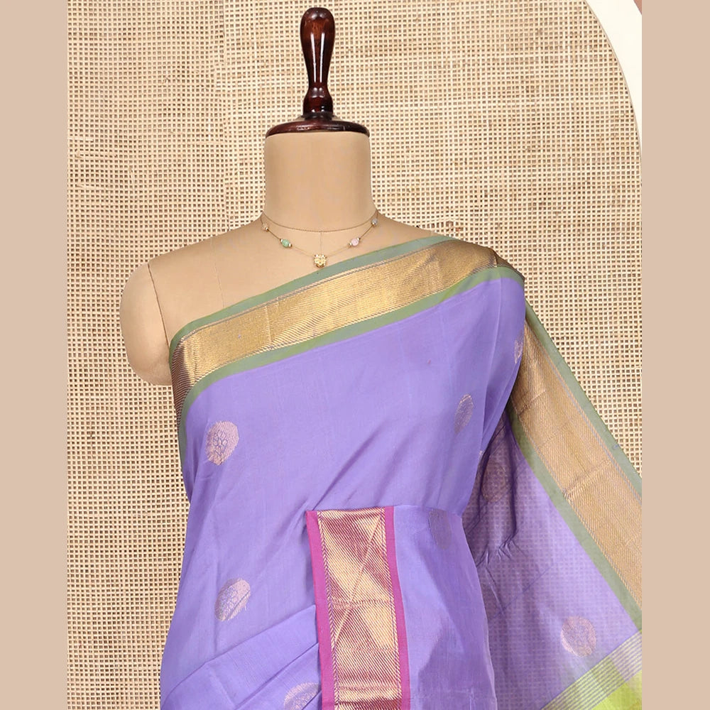 Pothys Lavender Poly Cotton Saree, Enthralled with Zari Buttas on Its Body, Complemented by Contrast Ganga-Jamuna Border, Chevron Striped Pallu, and Paired with a Contrast Blouse