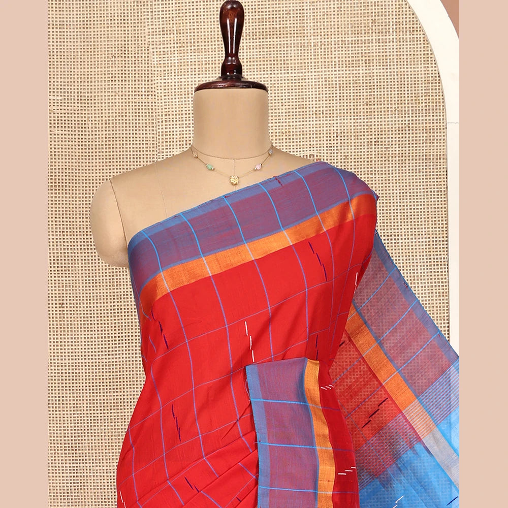 Pothys Red Poly Cotton Saree, Bedecked with Butta Enclosed Checks on Its Body, Complemented by Contrast Border, Pallu Steeped with Stripes, and Paired with a Contrast Blouse