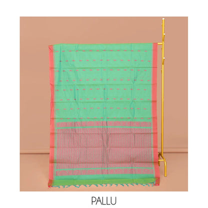 Pothys Green Kanchi Cotton Saree, Ornamented with Buttas All Over Its Body, Complemented by a Contrast Border, Pallu of Geometric Designs, and Paired with a Matching Blouse