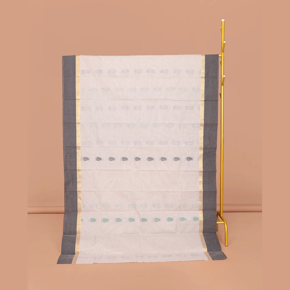 Pothys Off-White Kanchi Cotton Saree, Decked Up with Buttas All Over Its Body, Complemented by a Contrast Border, Pallu of Paisley Designs, and Paired with a Matching Blouse