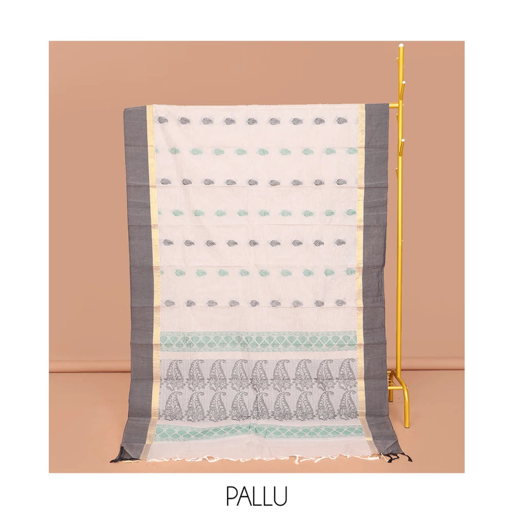 Pothys Off-White Kanchi Cotton Saree, Decked Up with Buttas All Over Its Body, Complemented by a Contrast Border, Pallu of Paisley Designs, and Paired with a Matching Blouse