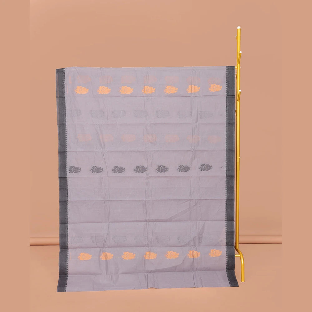 Pothys Grey Kanchi Cotton Saree, Decked Up with Buttas All Over Its Body, Complemented by a Contrast Border, Pallu of Floral and Geometric Designs, and Paired with a Matching Blouse