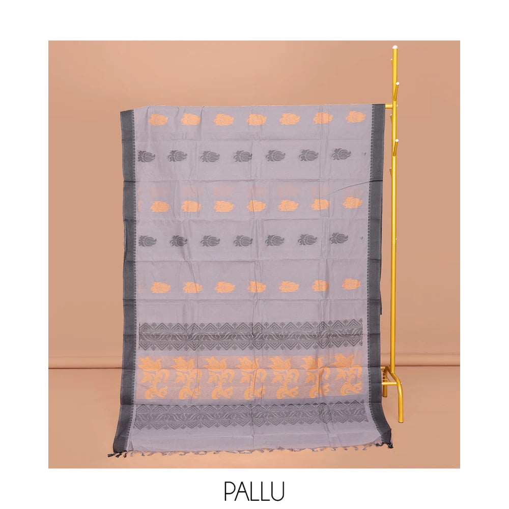 Pothys Grey Kanchi Cotton Saree, Decked Up with Buttas All Over Its Body, Complemented by a Contrast Border, Pallu of Floral and Geometric Designs, and Paired with a Matching Blouse