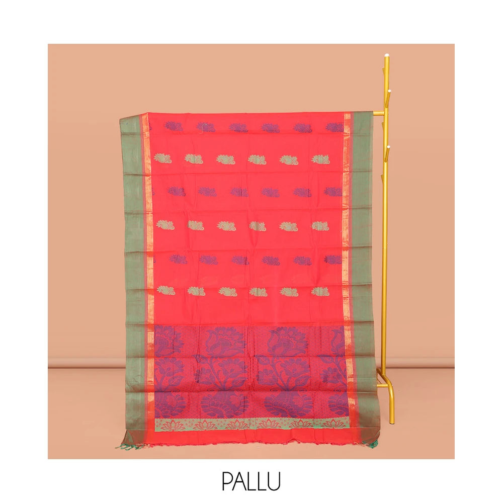 Pothys Red Kanchi Cotton Saree, Subtly Threaded with Floral Buttas All Over Its Body, Complemented by Contrast Zari Border, Pallu of Floral Designs, and Paired with a Matching Blouse