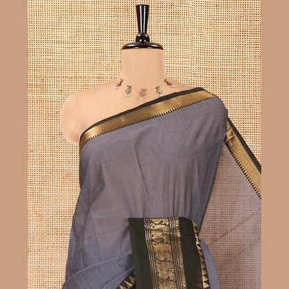 Pothys Grey Plain Chettinad Cotton Saree, Contrast Rettai Pettu Temple-Peacock Border, a Self-Pallu, a Matching Blouse