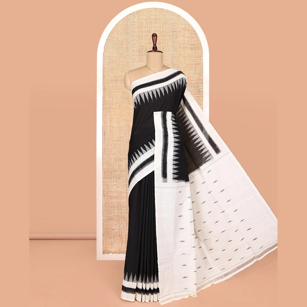 Pothys Black Plain Ikkat Cotton Saree, Complemented by a Contrast Ikkat Temple Border, Pallu Steeped with Buttas, and Paired with a Contrast Blouse