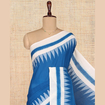 Pothys Blue Plain Ikkat Cotton Saree, Complemented by a Contrast Ikkat Temple Border, Pallu Steeped with Buttas, and Paired with a Contrast Blouse